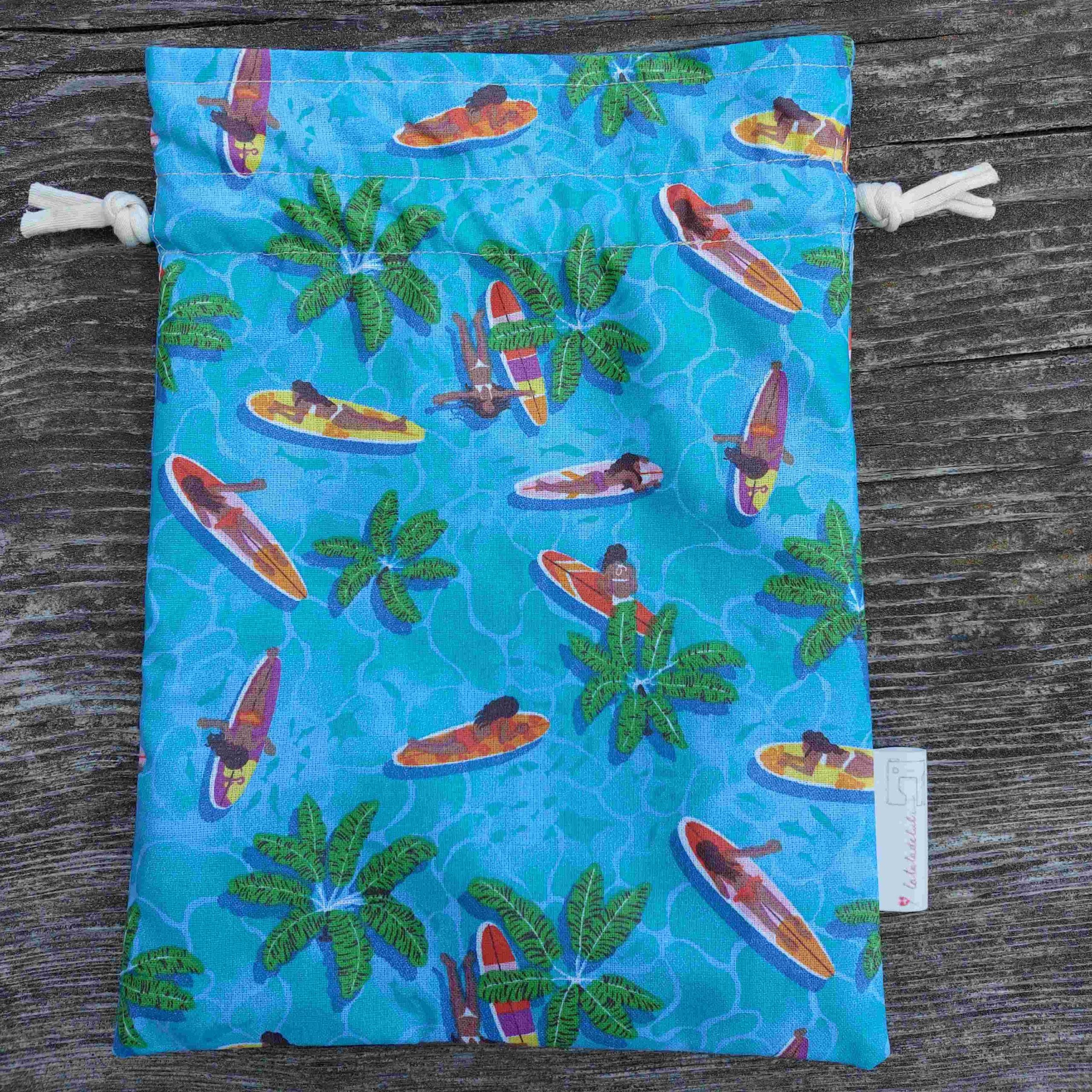 sac à maillot de bain mouillé bleu surf plage bikini plamier
