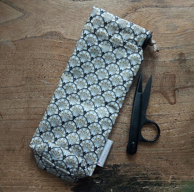 pochette parapluie mouillé détail finitions soin